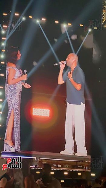 تامر عاشور يشارك أنغام غناء "لوحة باهتة" من ألحانه بمهرجان العلمين.. صور