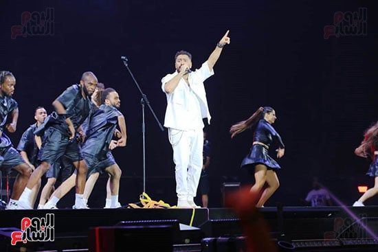 تامر حسنى يقدم أغانى "لينا معاد" و"حبك لو غلطة" فى حفل مهرجان العلمين.. صور