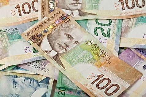 الدولار الكندي يرتفع عقب صدور بيانات التضخم الإيجابية