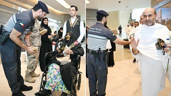 شرطة أبوظبي تودّع فوجاً من الحجاج بالورود والهدايا