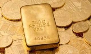 الذهب يتراجع وسط استقرار الدولار وتوقعات الفائدة الأمريكية