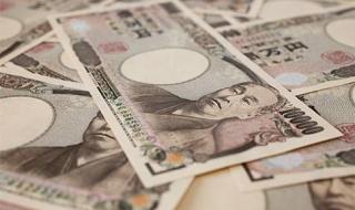 الين تحت الضغط السلبي بسبب الفائدة اليابانية