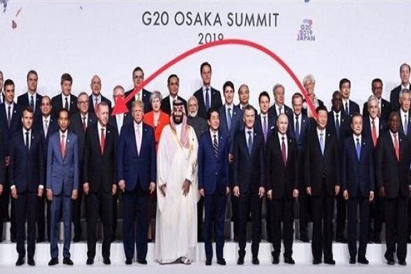 أردوغان يتسلل للوقوف بجانب ترامب في قمة العشرين