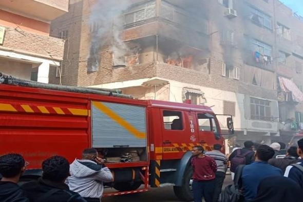 النيران تحاصر سكان شقة في إمبابة