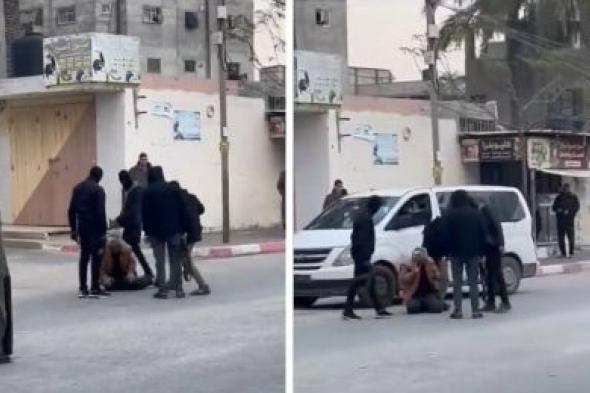 تراند اليوم : شاهد: عناصر من حركة حماس يرتدون أقنعة يضربون مسن أعزل وسط شارع عام في غزة