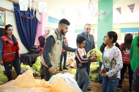 الامارات | "الهلال الأحمر" يوزع "كسوة العيد" على الأطفال الأيتام في اللاذقية
