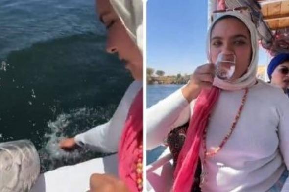 تراند اليوم : شاهد.. فتاة مصرية تشرب من مياه النيل وتثير الجدل