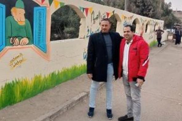 أهالى بهبيت يجملون مدخل قريتهم بجداريات فنية لاستقبال شهر رمضان.. صور