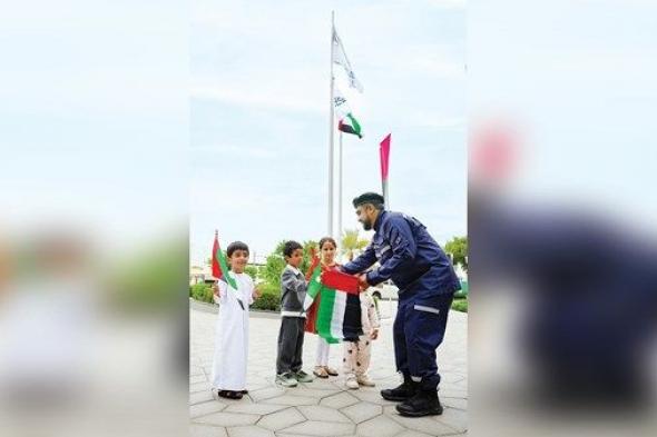 «أبوظبي للدفاع المدني» ترفع العَلم افتخاراً بالإمارات